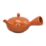 Théière japonaise rouge de Tokoname en terre cuite, vue de côté avec bec à gauche et anse latérale, 320 ml