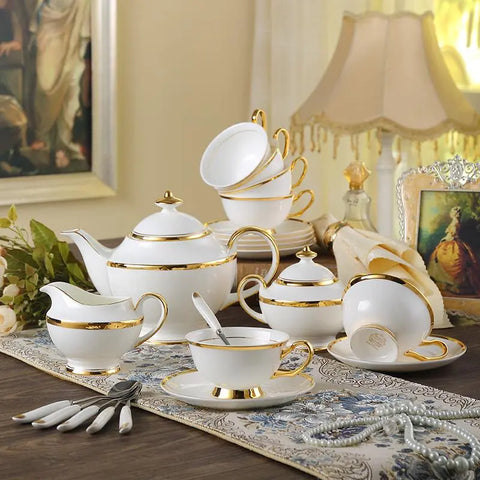 Service à thé & café en porcelaine manufacture Felly | GSLR Antiques Service à thé & café en porcelaine manufacture Felly | GSLR Antiques